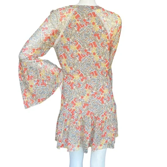 Alexis Floral Flowy Mini Babydoll Dress with Bell Sleeves and Tassels Size XS - Picture 10 of 14